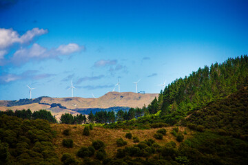 Scenic Landscape of Rolling Hills and Wind Turbines in Waikato, New Zealand. Concept of Renewable...