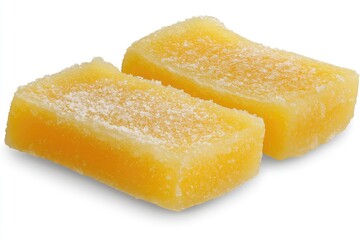 Two rectangular, light yellow, sweet,  jellied treats, dusted with a fine, sugar-like powder