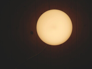 Warm light bulb with perfect circular shape 