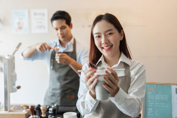 Eco-friendly Coffee Experience and Barista Creativity. A barista showcasing a sustainable coffee cup while engaging with eco-conscious customers.