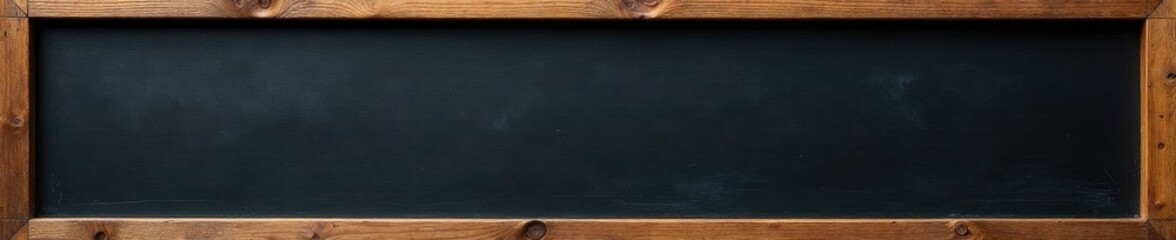 Rustic wooden frame surrounds blank black chalkboard , old, design