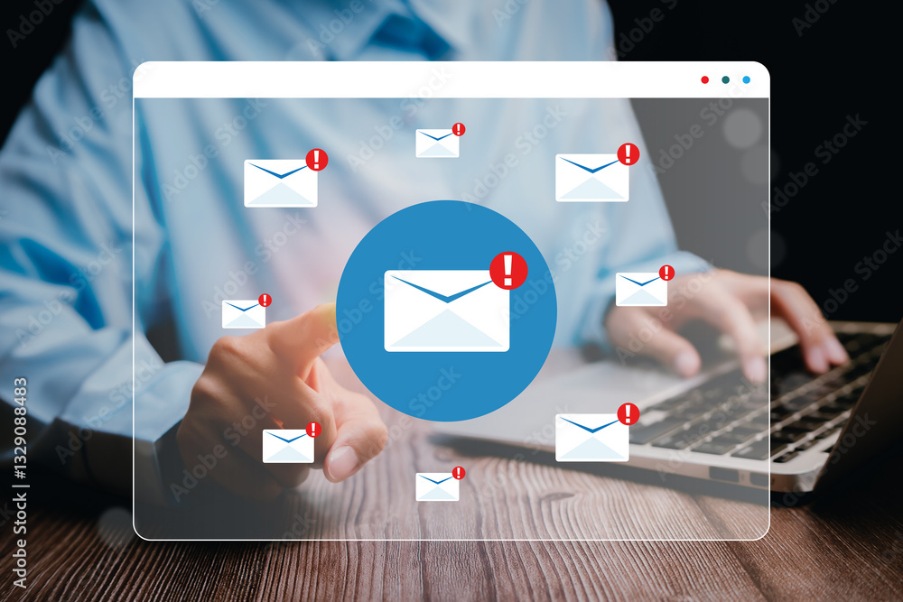 Poster person engaging with computer displaying multiple email notifications in modern workspace, business 