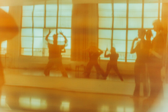 silhouette of people in the window