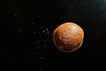 Juicy Hamburger on Black Background