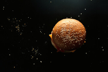 Juicy Hamburger on Black Background