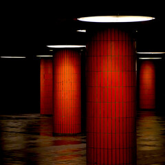 monumental underground pillars in red light darkness