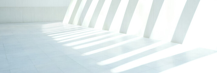 Obraz premium Light and shadow interplay in a modern minimalist interior space during daylight hours