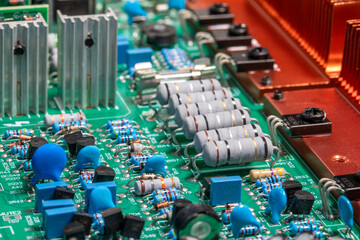 Electronic circuit board, transistors, resistors, capacitors, and diodes on the printed of an...
