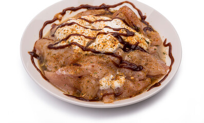 Raw, fresh chicken in chicken sauce.
Clipping path included.