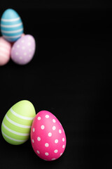 easter egg vertical black background empty blank copy space april event spring celebration