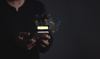 Excellence Review, Young Man hand holding Smart Phone with five star to review and give 5 stars with very good results in service, Good review 5 star rating choice feedback