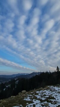 cFootage Full HD 1080x1920 vertical frames, portrait mode, louds over the lake