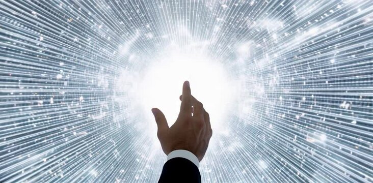Hand touching light. Metaphor for spiritual enlightenment or technology.
