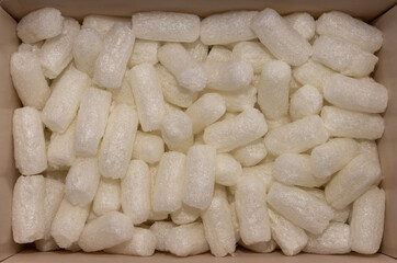 Close-up with biodegradable loose fill packaging chips