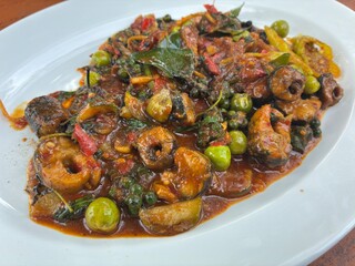 Stir-fried spicy eel on a plate