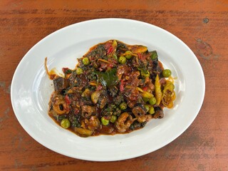 Fried frog with garlic on a plate