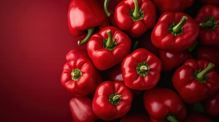 Fresh red bell peppers arranged on a vibrant background