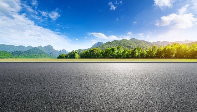  Asphalt road square and green forest with mountain natural landscape under blue sky