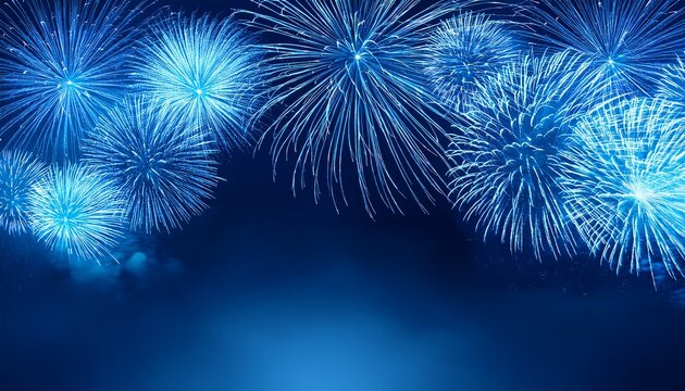  Blue fireworks against a dark blue sky background with copy space, a banner design. New year