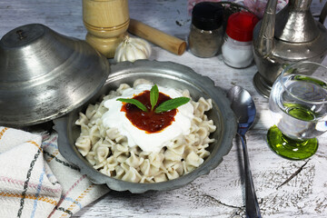 Mantı - Turkish ravioli pasta on wood concept