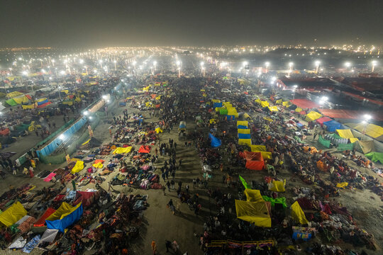 Prayagraj, India - January 2025: View of people gathering for Prayag Kumbh Mela, a holy festival for devotes happening in Triveni Sangam in Prayagraj, Uttar Pradesh, India.
