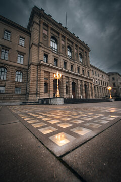 View of ETH Zurich building with gothic architecture and classic facade under a cloudy sky, Zurich, Zurich, Switzerland.