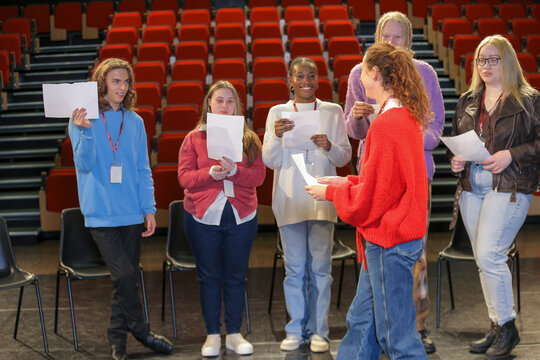 Persons with disabilities holding script