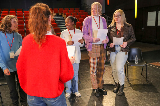 Persons with disabilities holding script