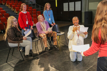 Actors with disabilities rehearsing on stage