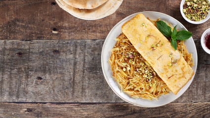 Balaleet - traditional Arabic breakfast. Sweet vermicelli with saffron, cardamom and egg omelette. Arabic, Emirati food.