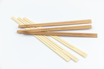 Bamboo chopsticks on white background