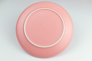 Pink round empty porcelain plate