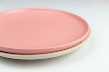 Pink round empty porcelain plate