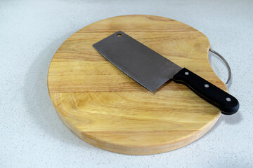 Wooden cutting board and knife