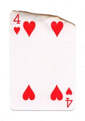 A partly burnt playing card in the suit of hearts.