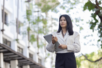 Future remote work combines technology smart phone connection online white digital business woman...