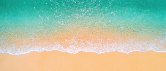 Aerial View of Turquoise Ocean Waves Gently Crashing on a Sandy Beach
