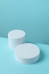 White podiums on a blue background