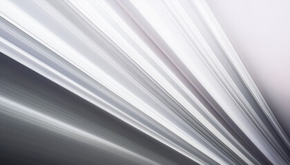 Obraz premium Elegant diagonal streaks of soft light reflections, creating a delicate and sophisticated design on a white background. 