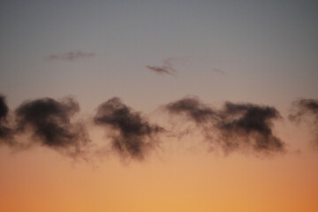 Parade of clouds in the evening sky
