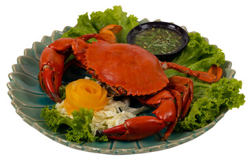 seafood plate fresh crab cooking on white plate background , blue swimming crab meat claw served on a food table - cooking steamed crab with seafood sauce top view
