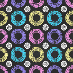 Fototapeta premium Seamless Grunge Pattern of Chalk Drawn Sketches Colored Circles on Dark Blackboard. Symmetrical Vintage Print.
