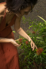 Woman connecting to mother earth and her feminine energy