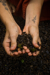 Woman connecting to mother earth and her feminine energy