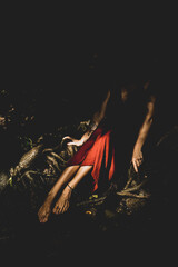 Woman connecting to mother earth and her feminine energy