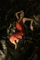 Woman connecting to mother earth and her feminine energy