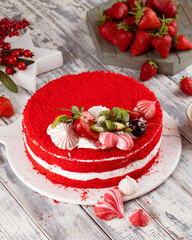 Red Velvet cake with fruit decorated on a light background