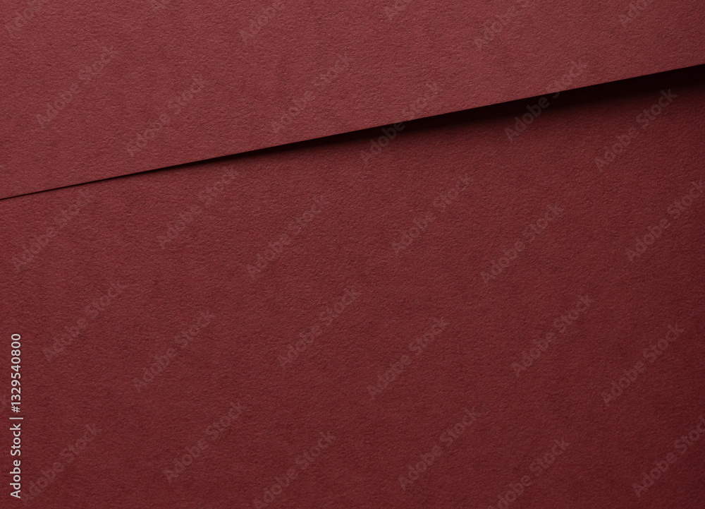 Poster deep burgundy paper background with a matte, grainy texture and subtle fibrous surface. elegant red 