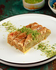 Turkish baklava with pistachios served on a plate