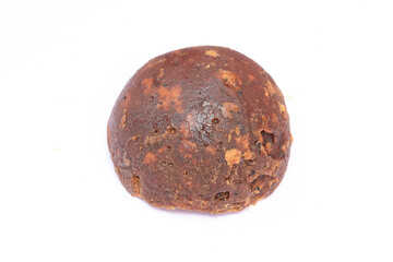 Palm jaggery isolated in a white background, south indian tamil nadu sweet made from palm jaggery